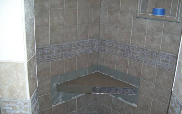 tiling a corner seat in a shower